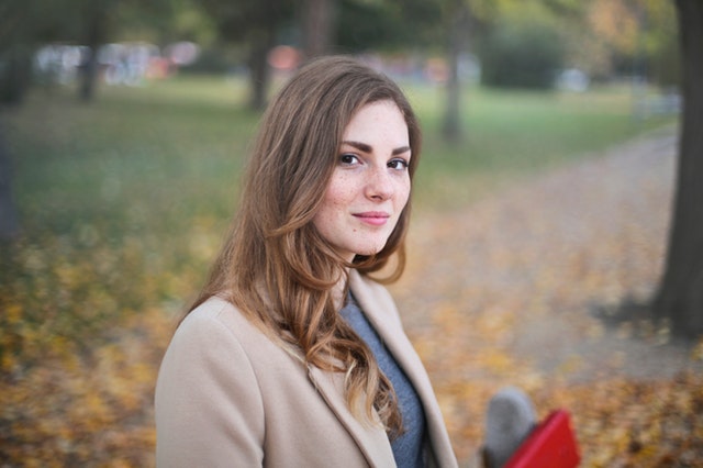 brown-haired-woman-wearing-brown-blazer-focus-photo-712521