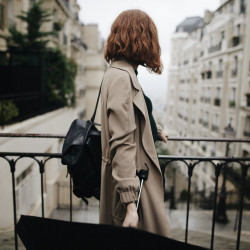 shallow-focus-photography-of-woman-beside-fence-1684915