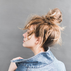 back-view-of-woman-holding-her-denim-jacket-789812-3