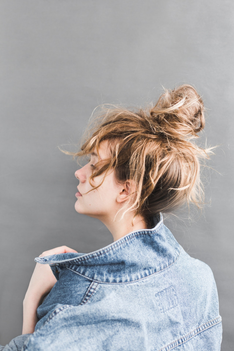 back-view-of-woman-holding-her-denim-jacket-789812-3